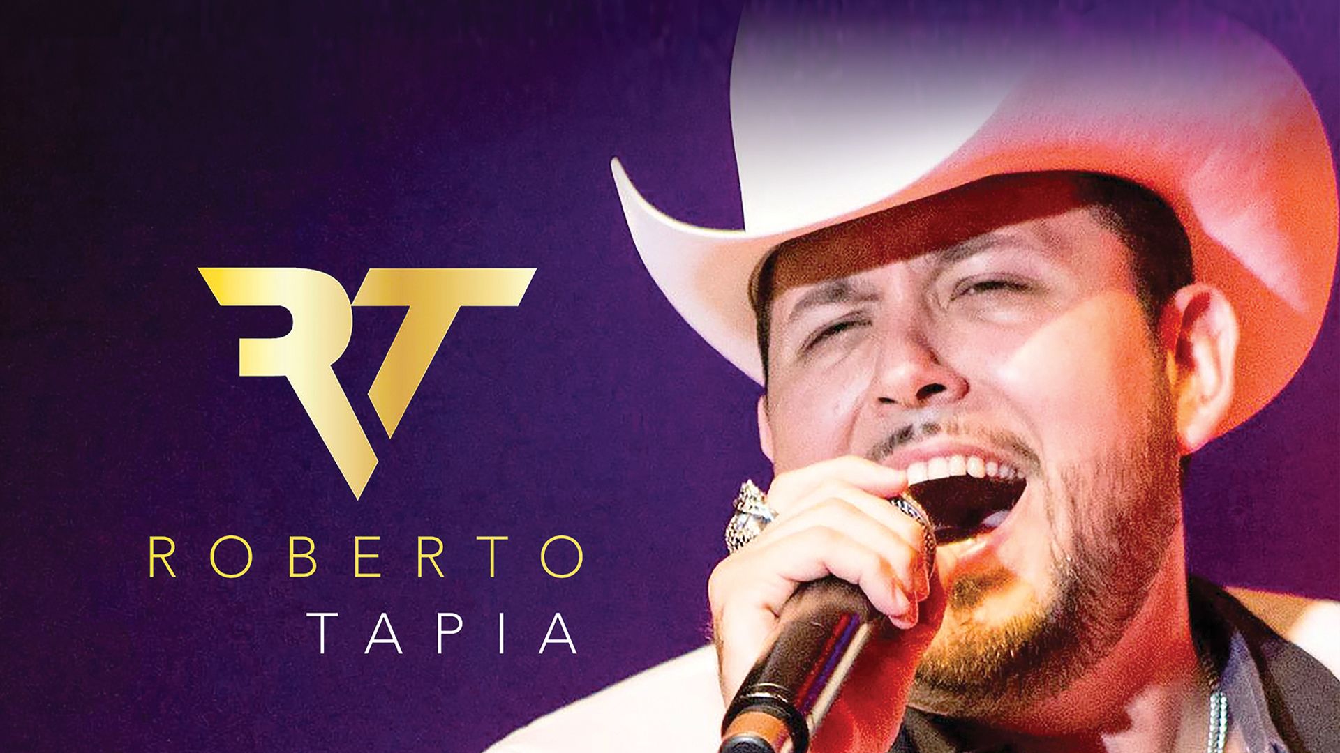 Roberto Tapia Wearing A Hat Talking On A Cell Phone